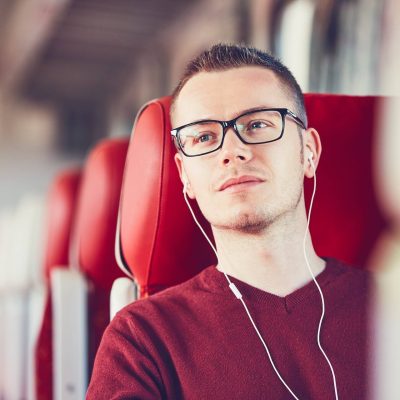 young-man-traveling-by-train-2021-08-26-22-38-53-utc.jpg